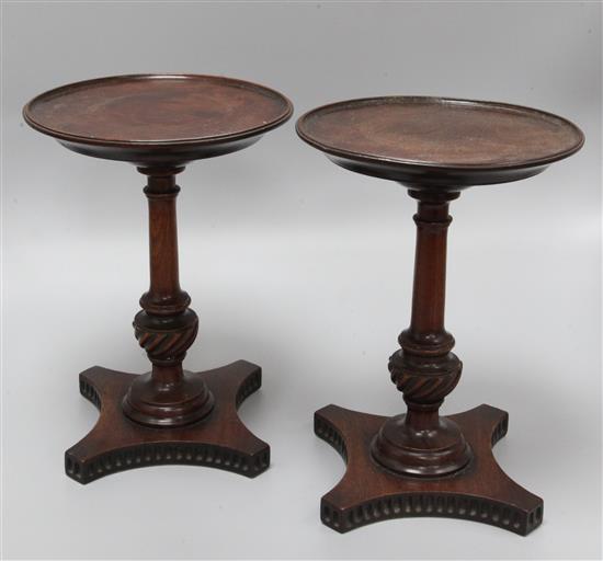 A pair of Georgian design mahogany candle stands